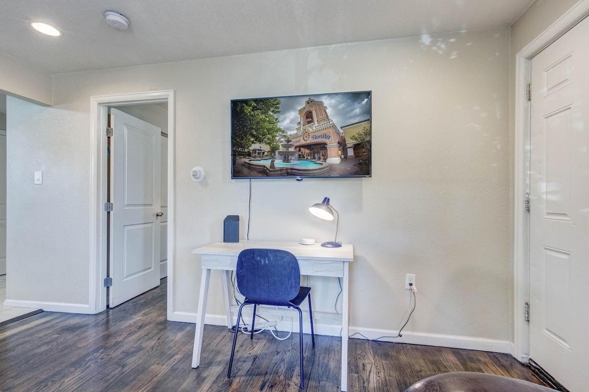 A dedicated work station with a desk and high-speed wi-fi. Smart HD TV providing hundreds of cable channels, Netflix, and more.